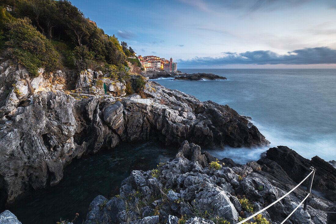 The first lights of the evening on the village of Tellaro, municipality of Lerici, La Spezia province, Liguria district, Italy, Europe