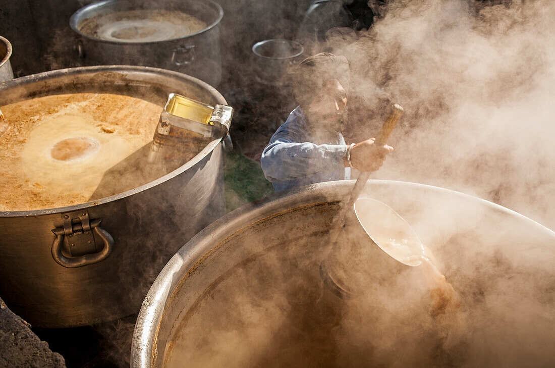 Maiking chai. Volunteer cooking for the pilgrims who visit the Golden Temple, Each day they serve free food for 60,000 - 80,000 pilgrims, Golden temple, Amritsar, Punjab, India