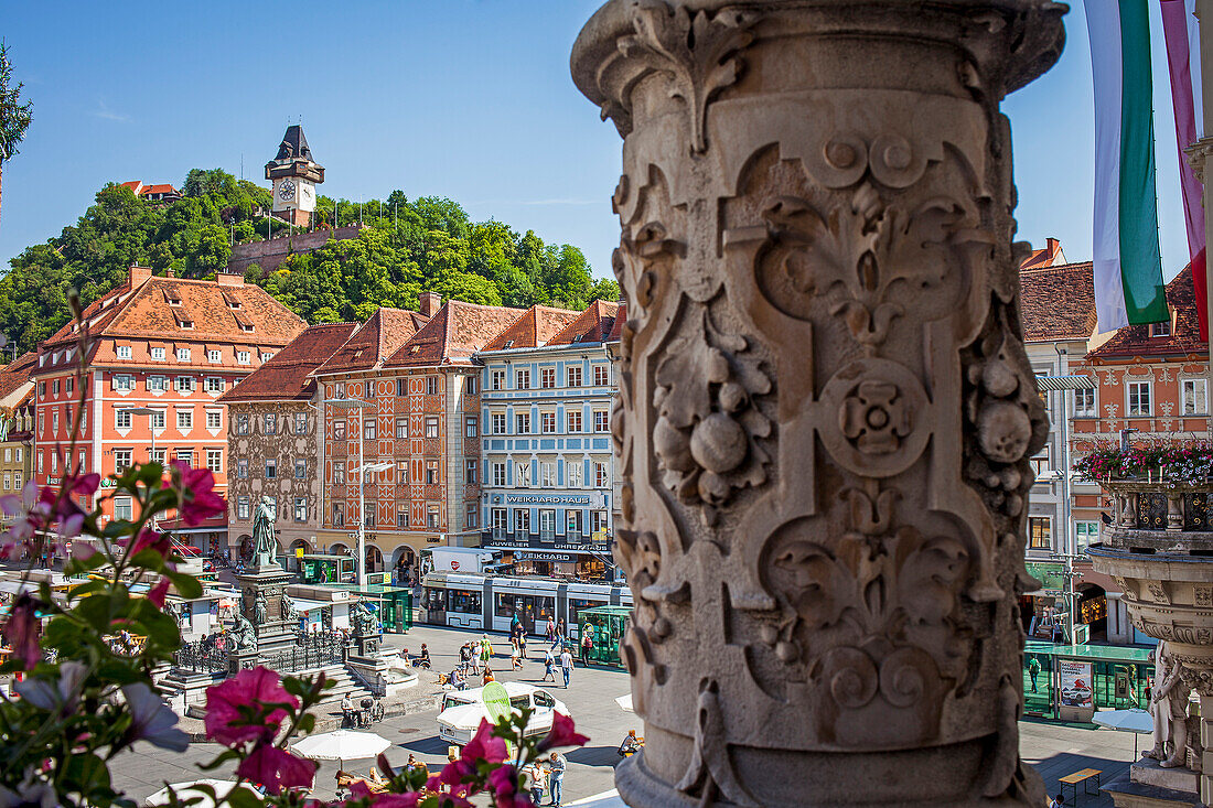 Cityscape with Schlossberg or Castle Hill mountain with old clock tower Uhrturm and Hauptplatz, from the city hall, Graz