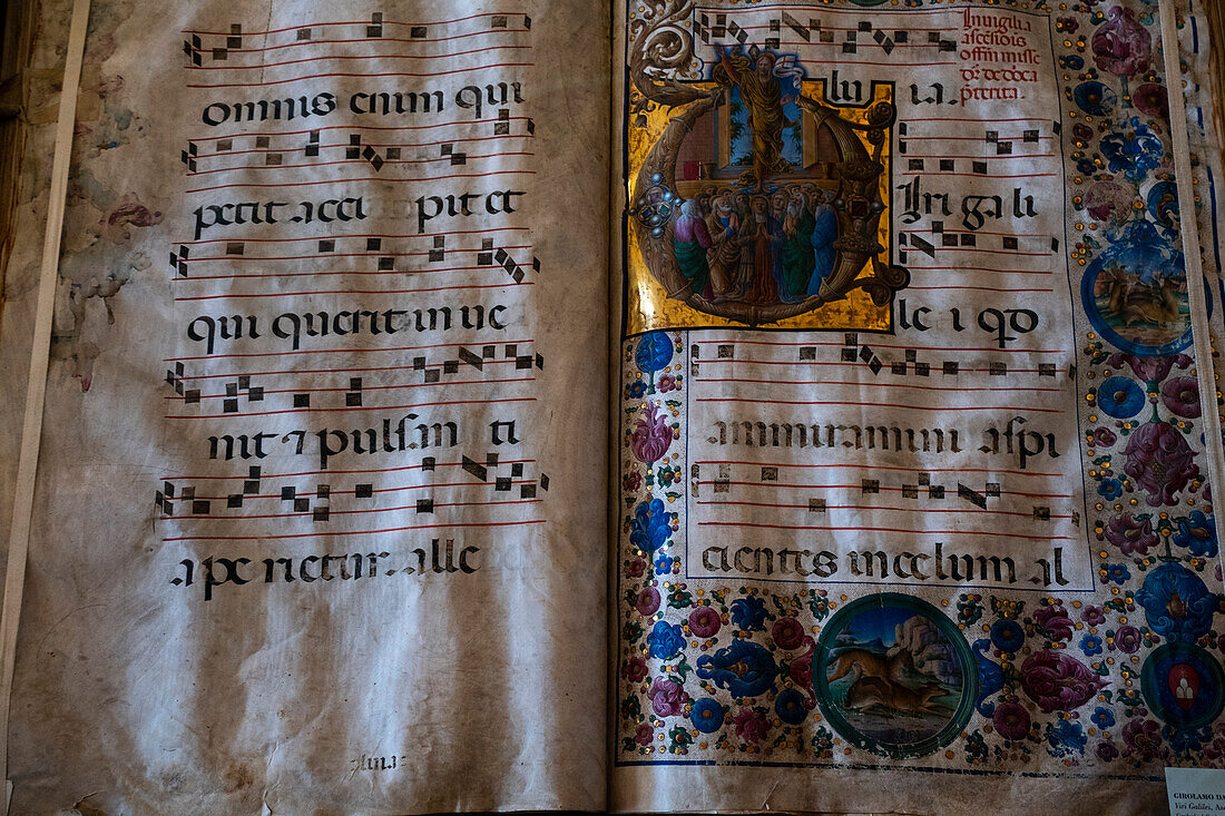 Italy, Tuscany, Siena, Santa Maria Assunta cathedral museum, Old music books painted by scribes