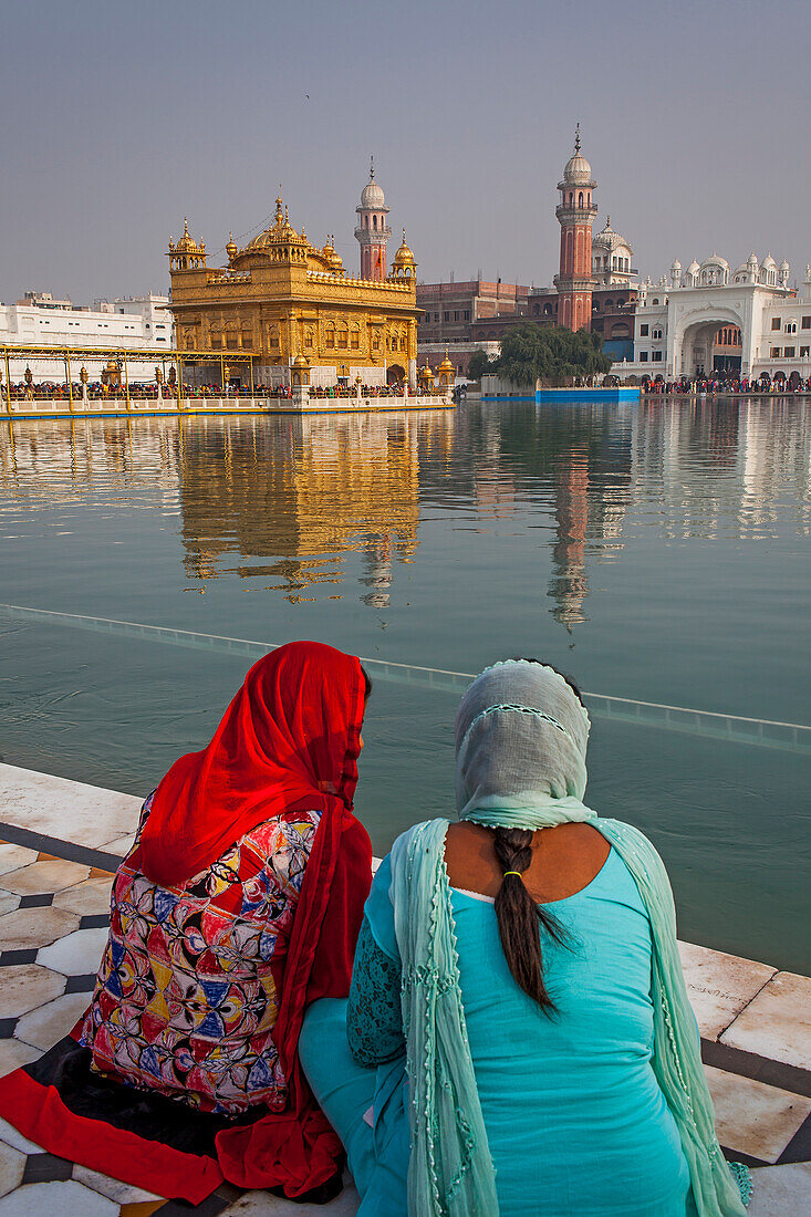 pilgrims and sacred pool Amrit Sarovar, Golden temple, Amritsar, Punjab, India