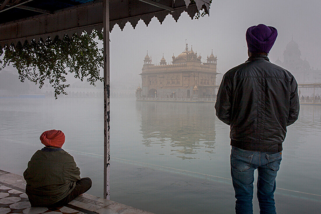 pilgrims and sacred pool Amrit Sarovar, Golden temple, Amritsar, Punjab, India