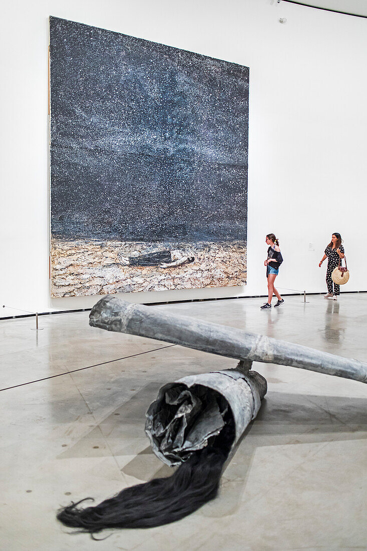 On the floor the sculpture called `Berenice´. And on the wall the painting called `The renowned orders of the night´, both by Anselm Kiefer, Guggenheim Museum, Bilbao, Spain