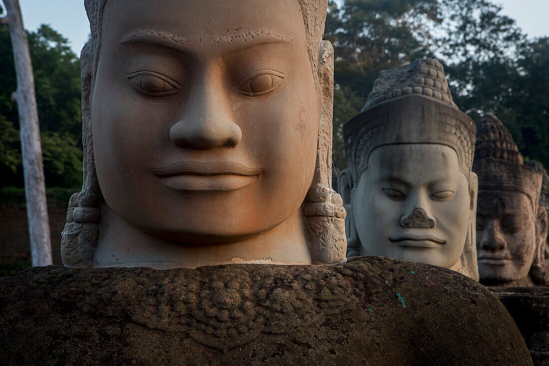 Detail, statues of Asuras on bridge of South Gate, in Angkor Thom, Siem Reap, Cambodia