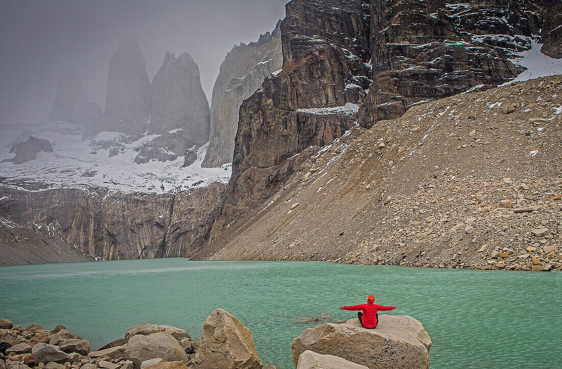 Man, Hiker, Mirador Base Las Torres. You can see the amazing Torres del Paine, Torres del Paine national park, Patagonia, Chile