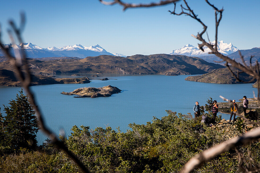 Lago Nordenskjöld and Hikers resting between Cuernos refuge and Campamento Italiano, Torres del Paine national park, Patagonia, Chile