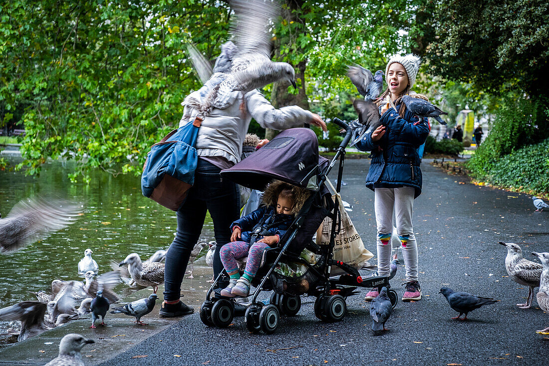 Mother and daughters, in St Stephen's Green park, Dublin, Ireland