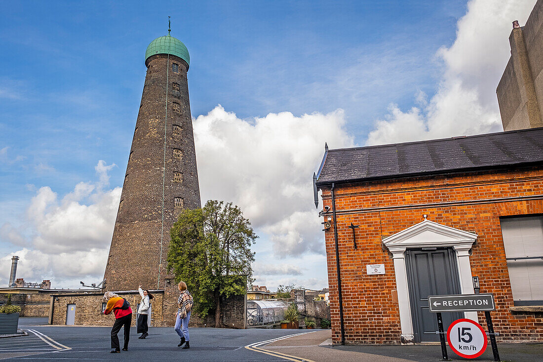 Tourists and St. Patrick's Tower, Roe Lane, The Digital Hub, Dublin, Ireland