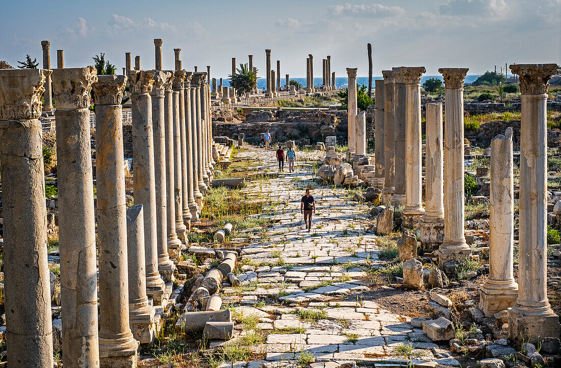 Men, tourists, Al-Mina archaeological site, Tyre (Sour), Lebanon.