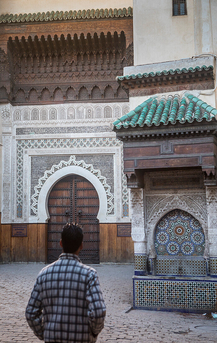 Place an-Nejjarine. In background, the brown door is the Art and wood crafts Museum . Fez.Morocco