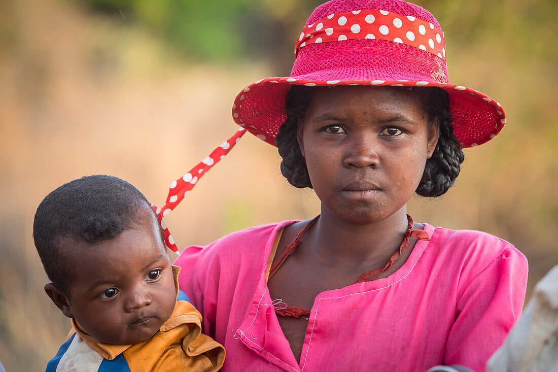 Portrait of Malagasy mother and son, surroundings of Manja village, Madagascar