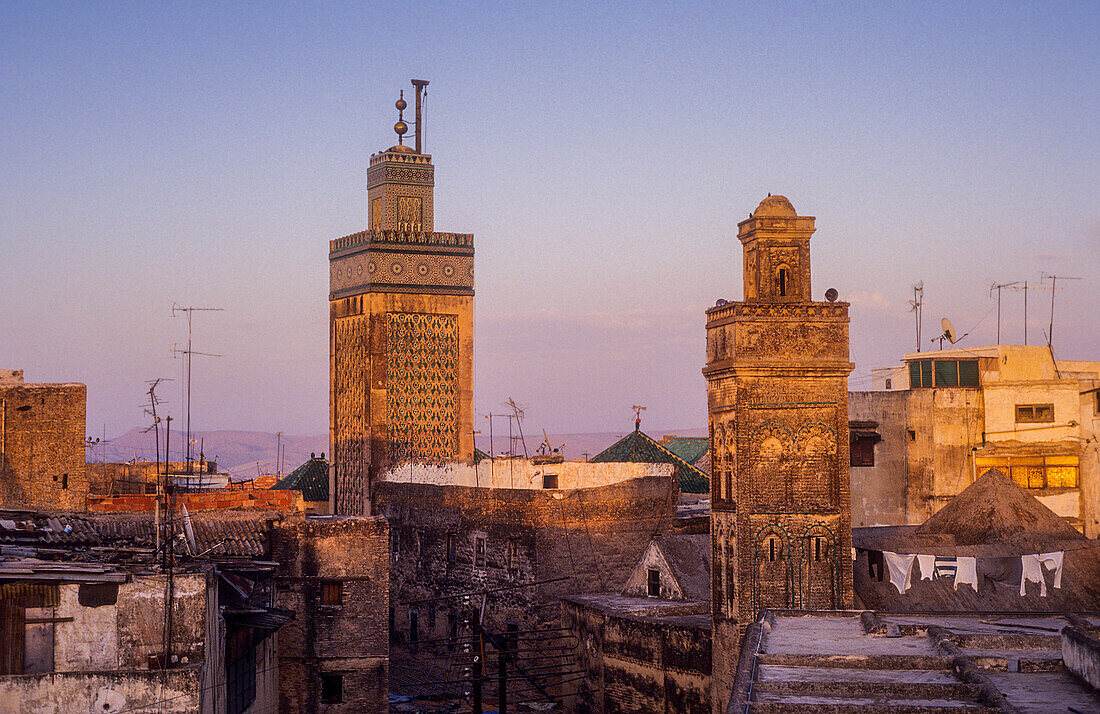 At right minaret of Sidi Lazaze, at left minaret of Medersa Bou Inania, Medina, UNESCO World Heritage Site, Fez, Morocco, Africa.