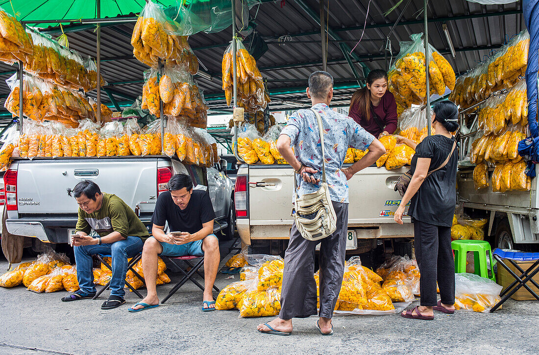 Flowers shop. Flowers inside bags at Pak Khlong Talat, a flower market in Bangkok, Thailand