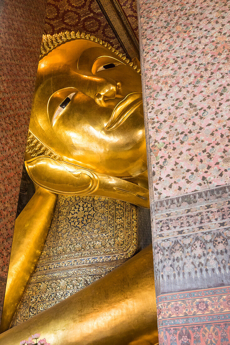 Golden big Buddha, in Wat Pho or Wat Phra Nakhon temple in Bangkok, Thailand