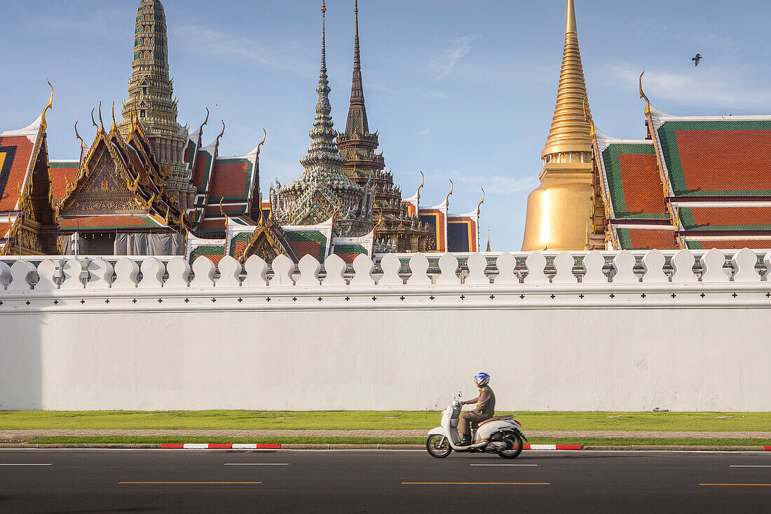 Street scene, in background the Emerald Buddha Wat Phra Kaeo temple, Grand Palace, Bangkok, Thailand