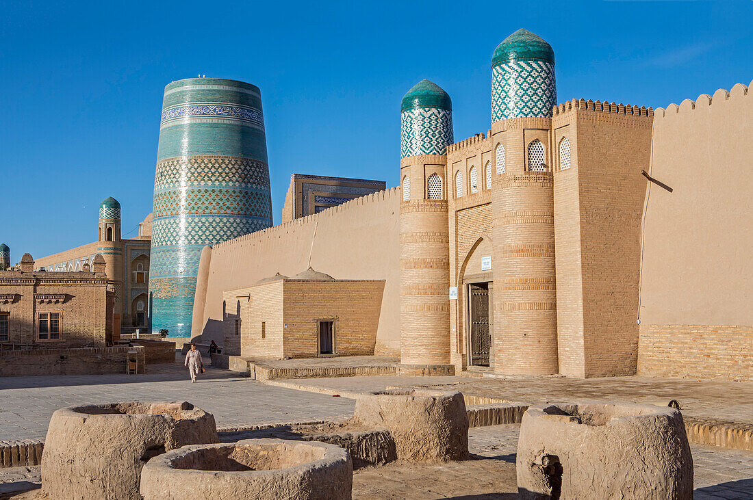 Kalta Minor minaret and Kuhna Ark, in Execution Square, Khiva, Uzbekistan