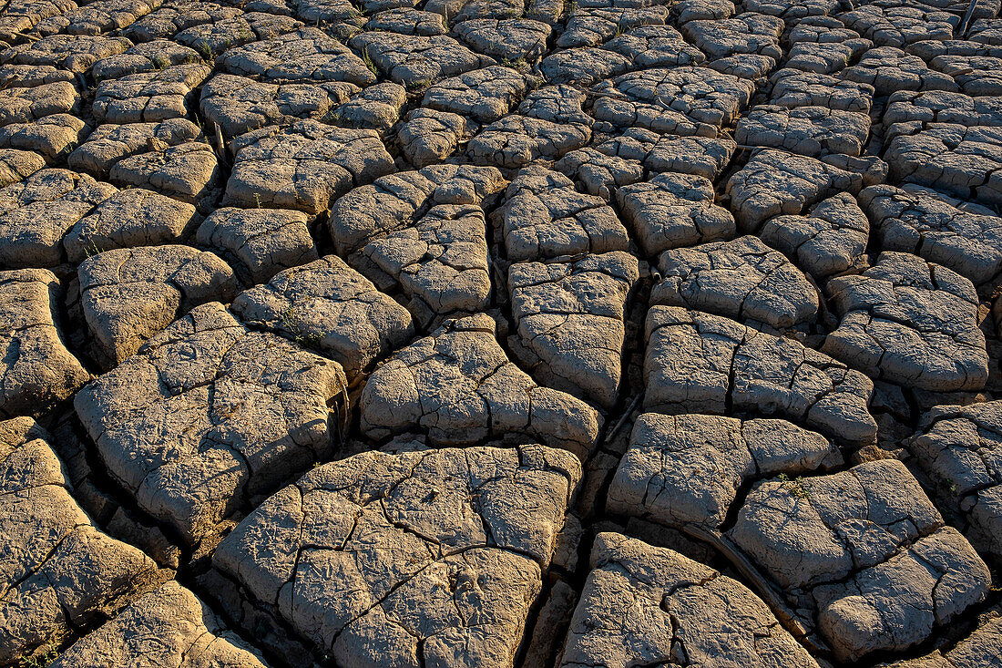 Dry reservoir of La Vinuela, reservoir declared dead due to lack of water, Malaga, Andalusia, Spain