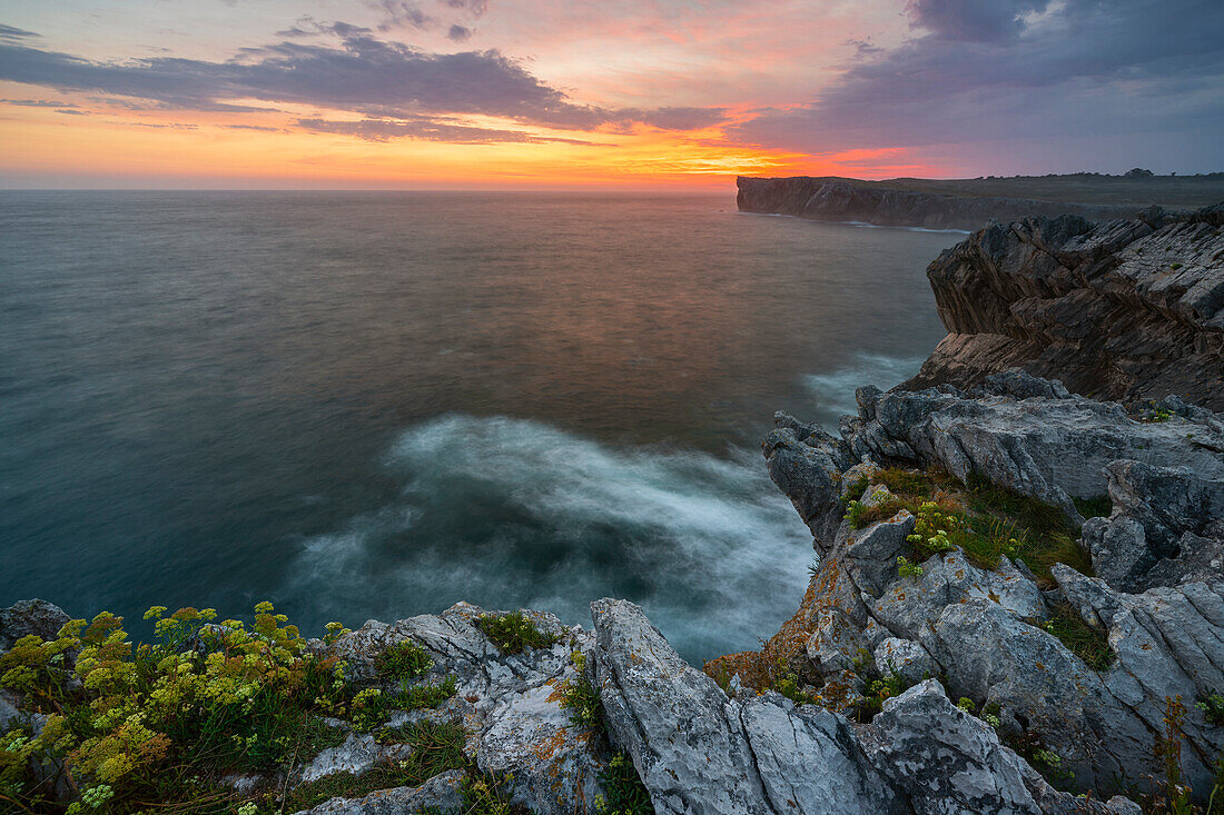View of cliffs at Area recreativa de Guadamia and Los Bufones de Pria at sunrise, Ribadesella, Asturias, Spain, Western Europe