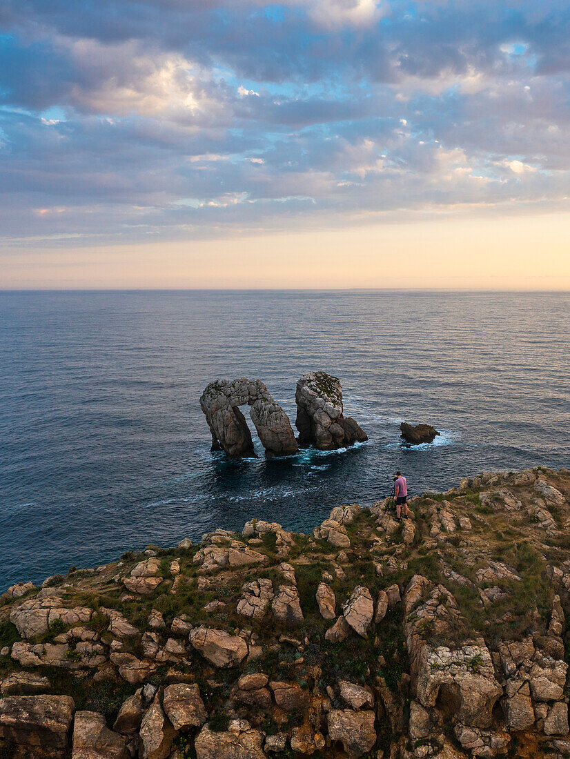 Aerial view at sunrise in front of Urro del Manzano with a photographer, Boo de Pielagos, Cantabria, Spain, Iberina Peninsula, Western Europe