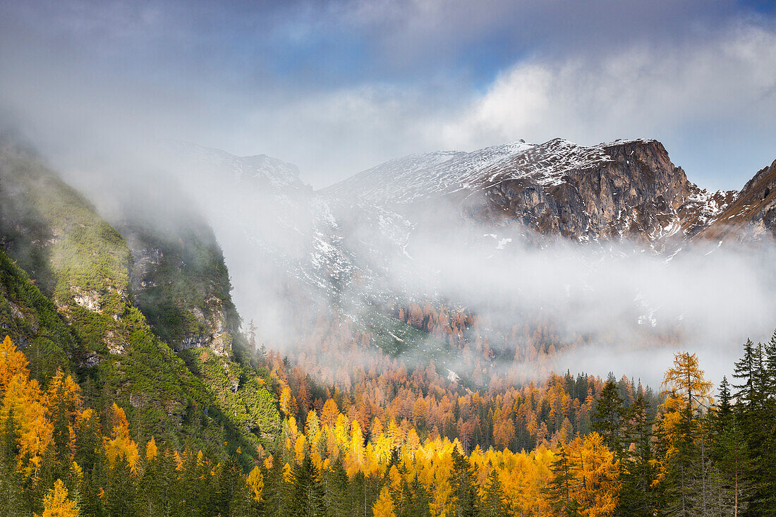 Mountains around Braies lake during autumn at sunrise, Braies, Bolzano, Trentino Alto Adige, Italy, Western Europe