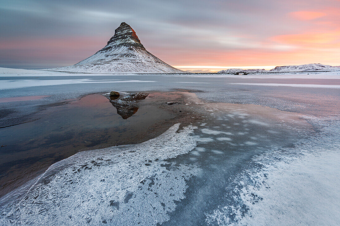 Sunrise with reflection at Kirkjufell, Grundarfjörður, Snæfellsnes peninsula, Vesturland region, Iceland, Northern Europe
