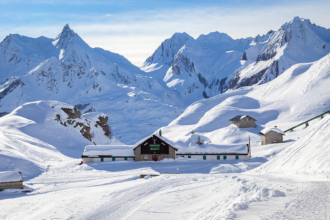 View of the Maria Luisa refuge in the high Formazza Valley in winter. Riale, Formazza, Valle Formazza, Verbano Cusio Ossola, Piedmont, Italy.