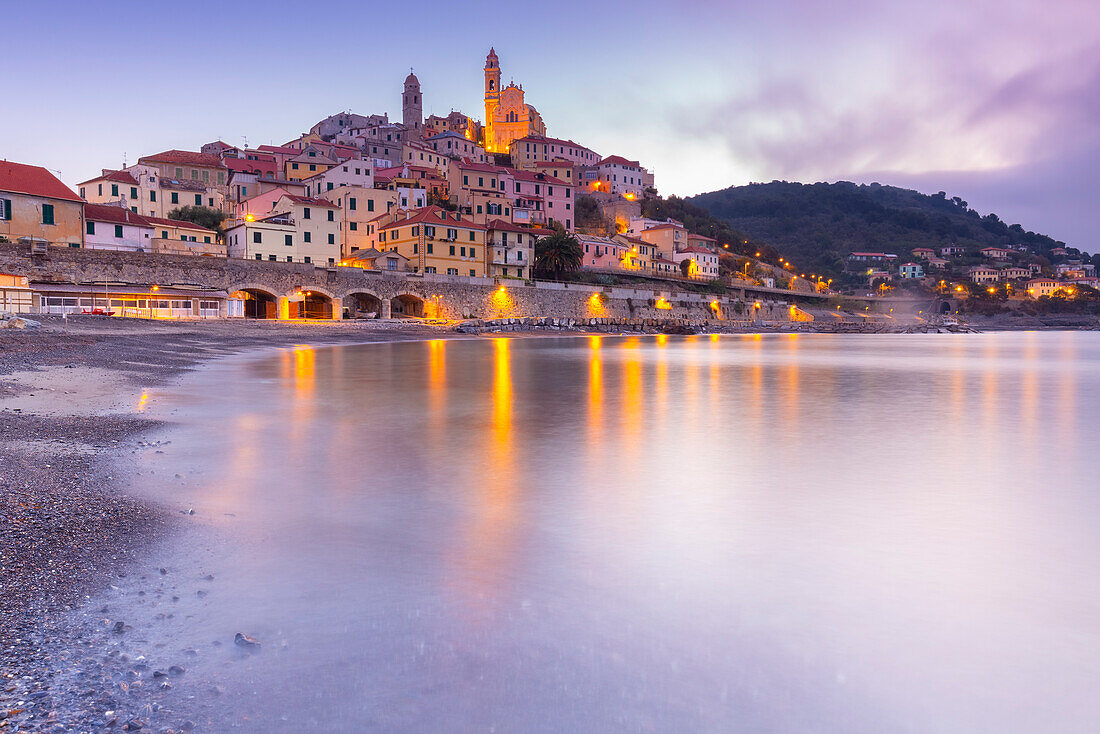 View of the colorful town and beach of Cervo at sunrise. Cervo, Imperia province, Ponente Riviera, Liguria, Italy, Europe.