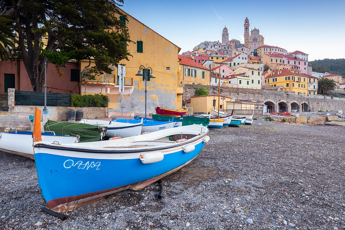 View of the colorful town of Cervo and boat on it's beach. Cervo, Imperia province, Ponente Riviera, Liguria, Italy, Europe.