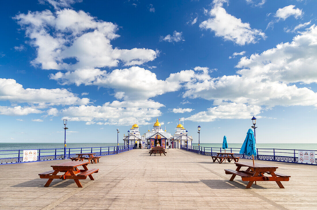 Daylight view of the Eastbourne pier from the shore. Eastbourne, East Sussex, England, United Kingdom.