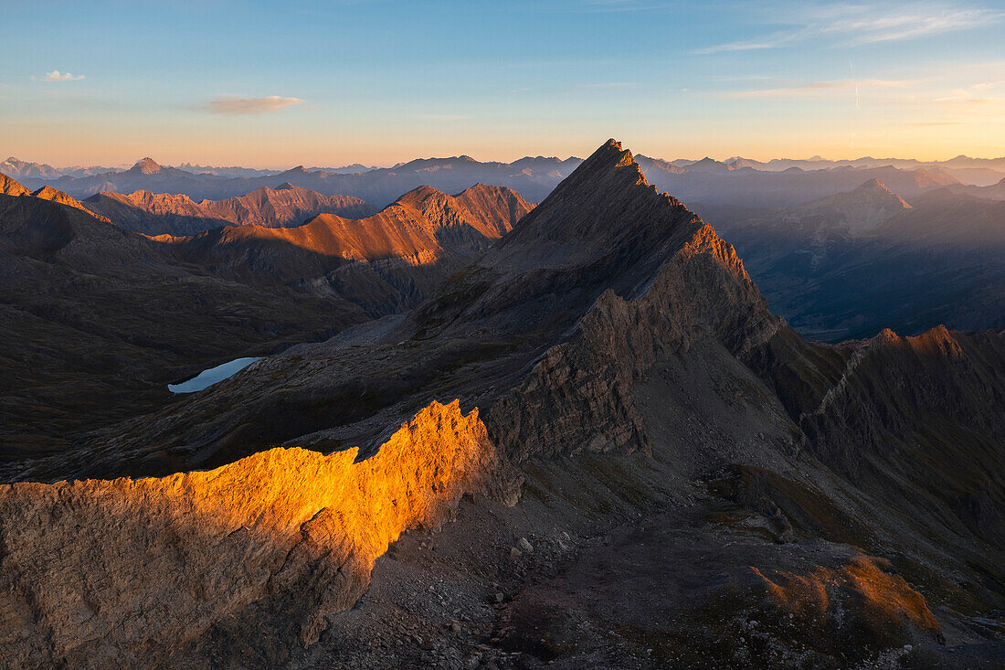 Aerial view of Crete de la Taillante at sunrise during summer, Col Agnel, Alpi Cozie, Cuneo, Provance, Piedmont, France, Italy, Southern Europe
