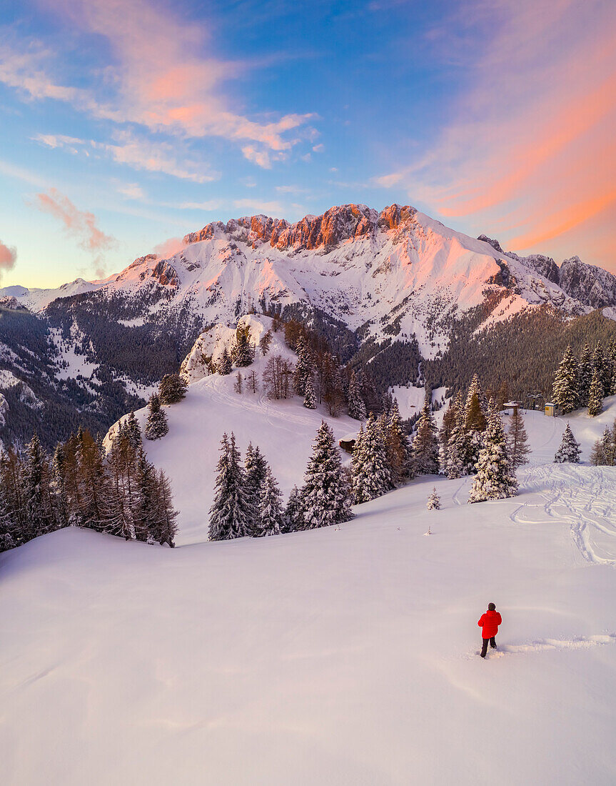 Aerial view of the Presolana covered in snow at sunset from Mount Scanapà. Castione della Presolana, Val Seriana, Bergamo district, Lombardy, Italy.