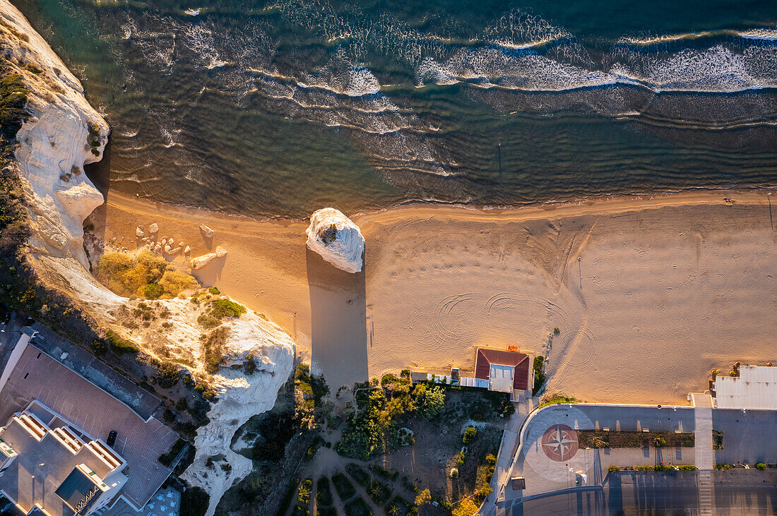 Aerial view of Pizzomunno beach and the white stack. Foggia province, Gargano National Park, Apulia, Italy.