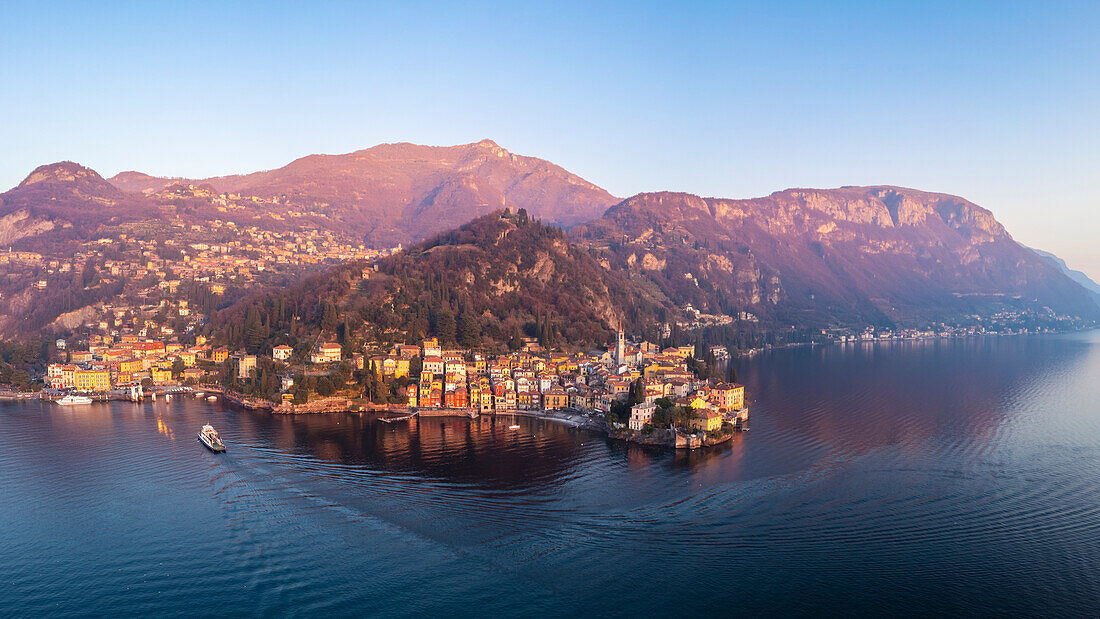 Aerial view of the town of Varenna, Lake Como, at sunset in winter. Varenna, Lecco district, Lombardy, Italy, Europe.