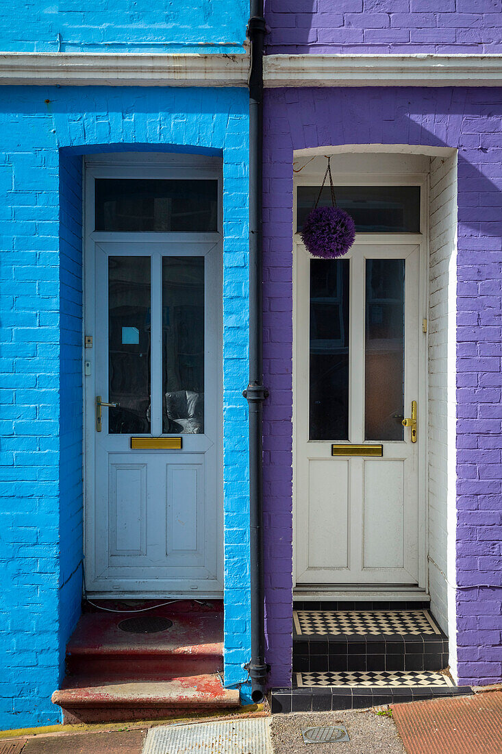 View of the doors of the colorful houses in Blaker street, Brighton, East Sussex, Southern England, United Kingdom.