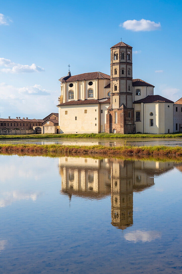 View of reflecting clouds on the rice fields of the Principality of Lucedio. Trino Vercellese, Vercelli district, Piedmont, Italy.