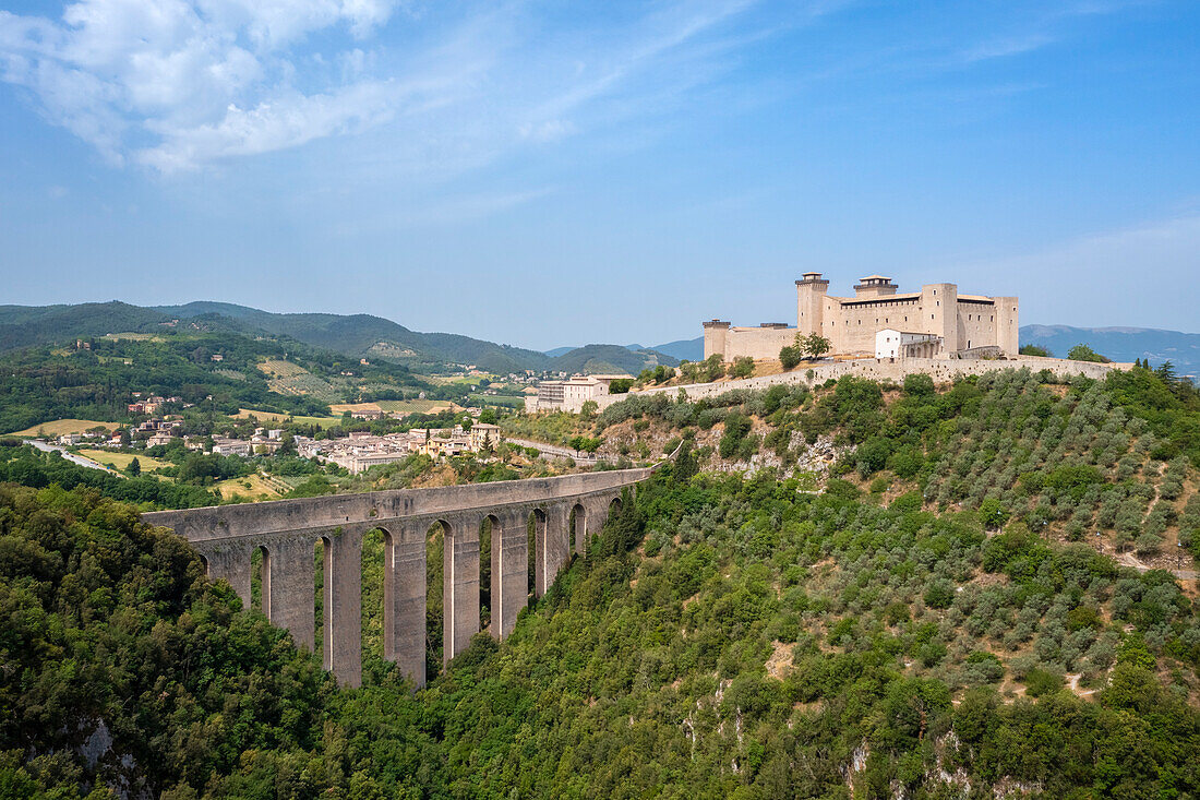 Aerial view of the Rocca Albornoziana fortress and the aqueduct of Spoleto. Spoleto, Perugia district, Umbria, Italy, Europe.