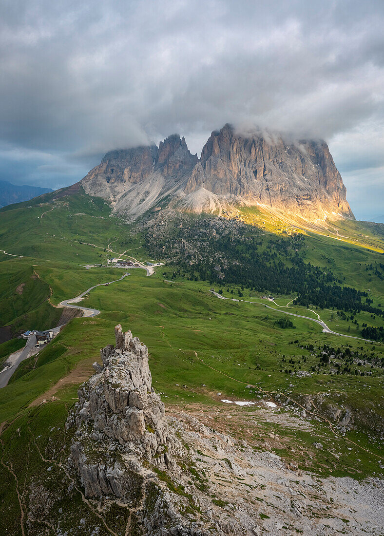 Aerial view of the Sassolungo group during a summer sunrise from Sella Pass. Gardena Valley, Dolomiti, Unesco World Heritage Site, Bolzano district, Trentino Alto Adige, Italy, Europe.
