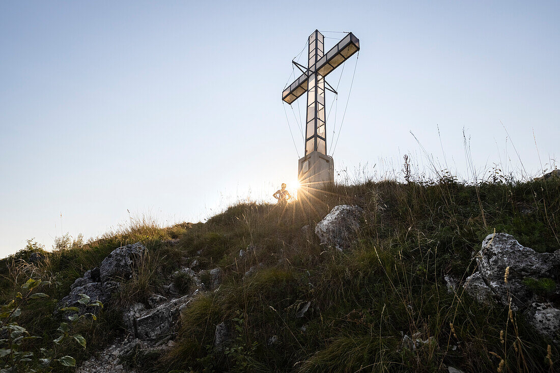View of the cross on the top of Poncione di Ganna mountain, Valganna valley. Cuasso al Monte, Varese district, Lombardy, Italy.