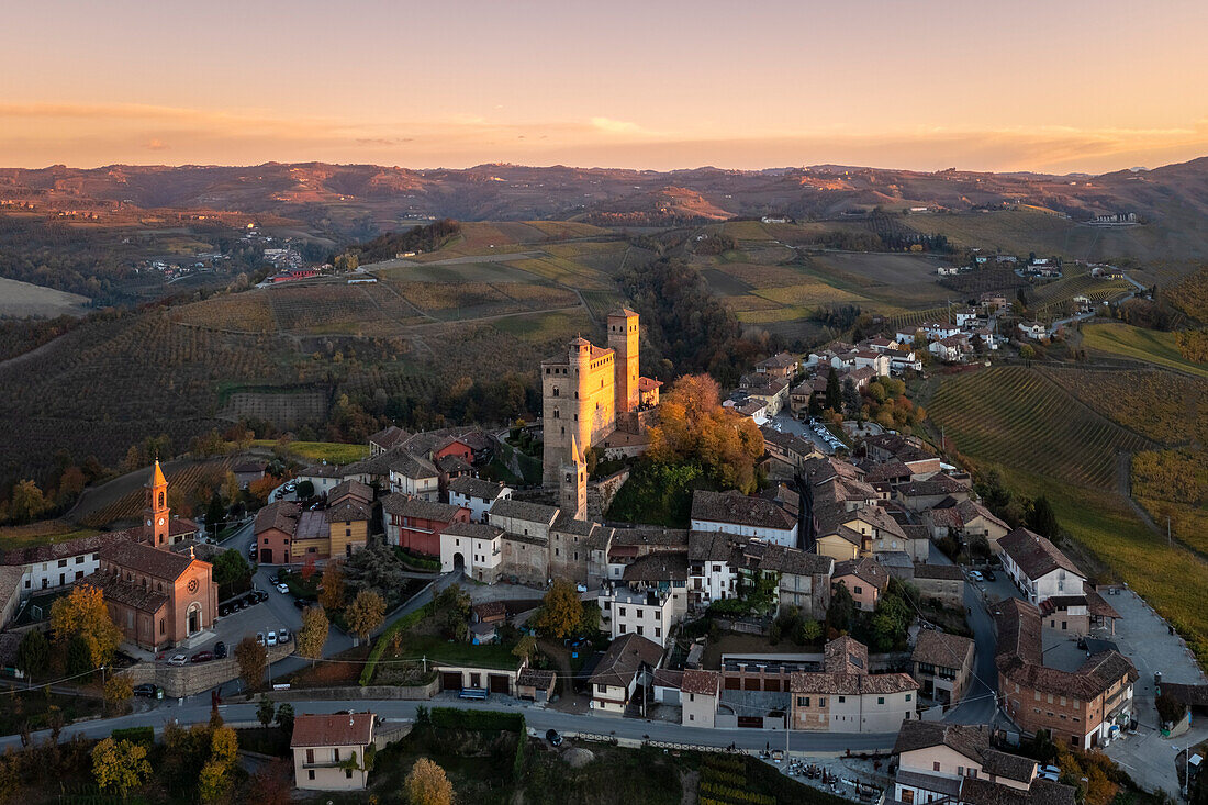 Aerial view of the medieval town of Serralunga d'Alba and its castle in autumn. Serralunga d'Alba, Langhe, Piedmont, Italy, Europe.