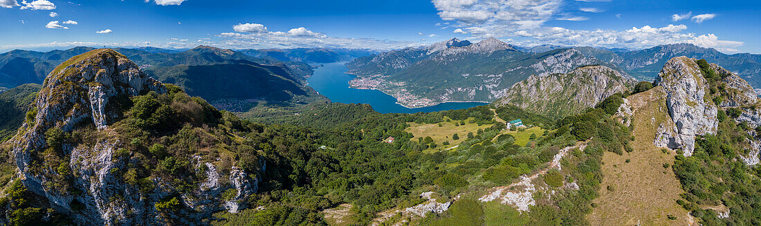 Aerial view of Rifugio Sev dominating on Como Lake (Lecco branch) and located below Corni di Canzo mountains. Valbrona, Como district, Lombardy, Italy, Europe