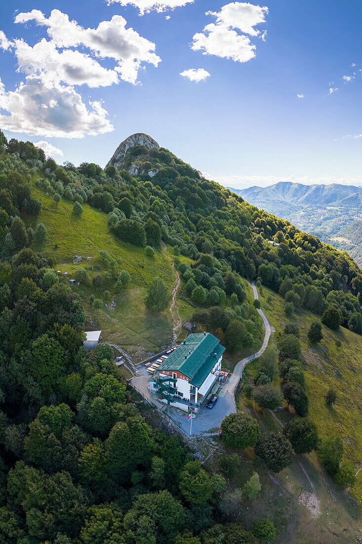 Aerial view of Rifugio Sev dominating on Como Lake (Lecco branch) and located below Corni di Canzo mountains. Valbrona, Como district, Lombardy, Italy, Europe