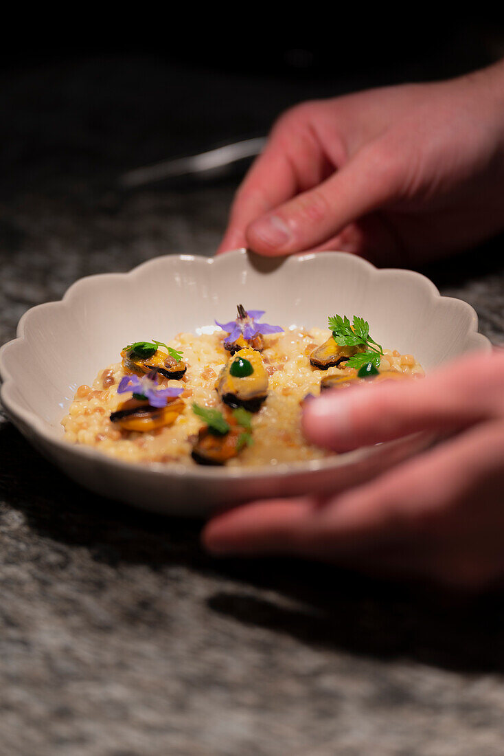 Preparation fregola pasta with mussels