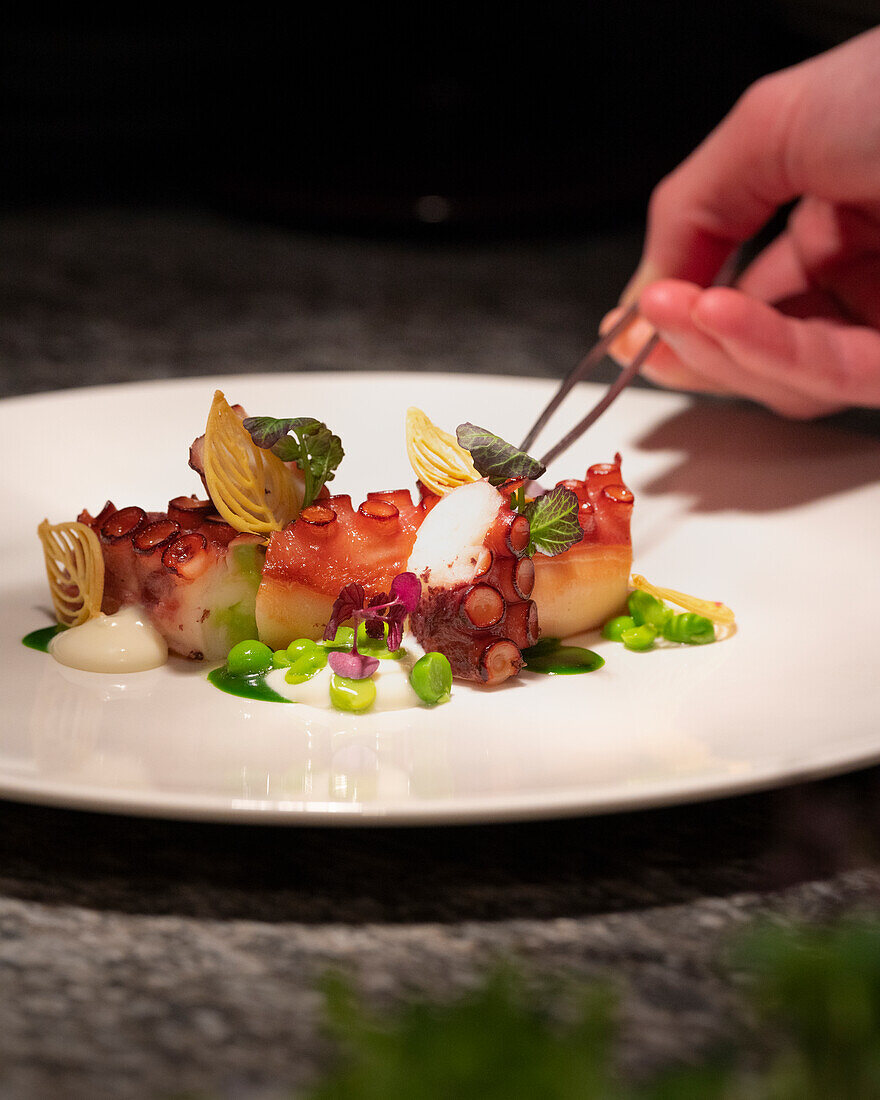 Bbq octopus, peas, crescenza and wild garlic