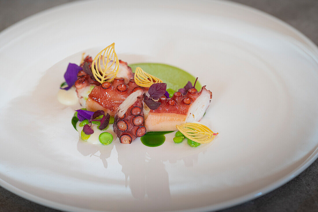 Bbq octopus, peas, crescenza and wild garlic