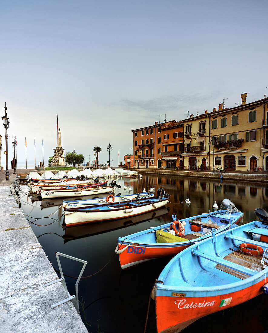 Port of Lazise del Garda, with typical fishing boats, Lazise del Garda, Verona, Verona province, Veneto, Lago di Garda