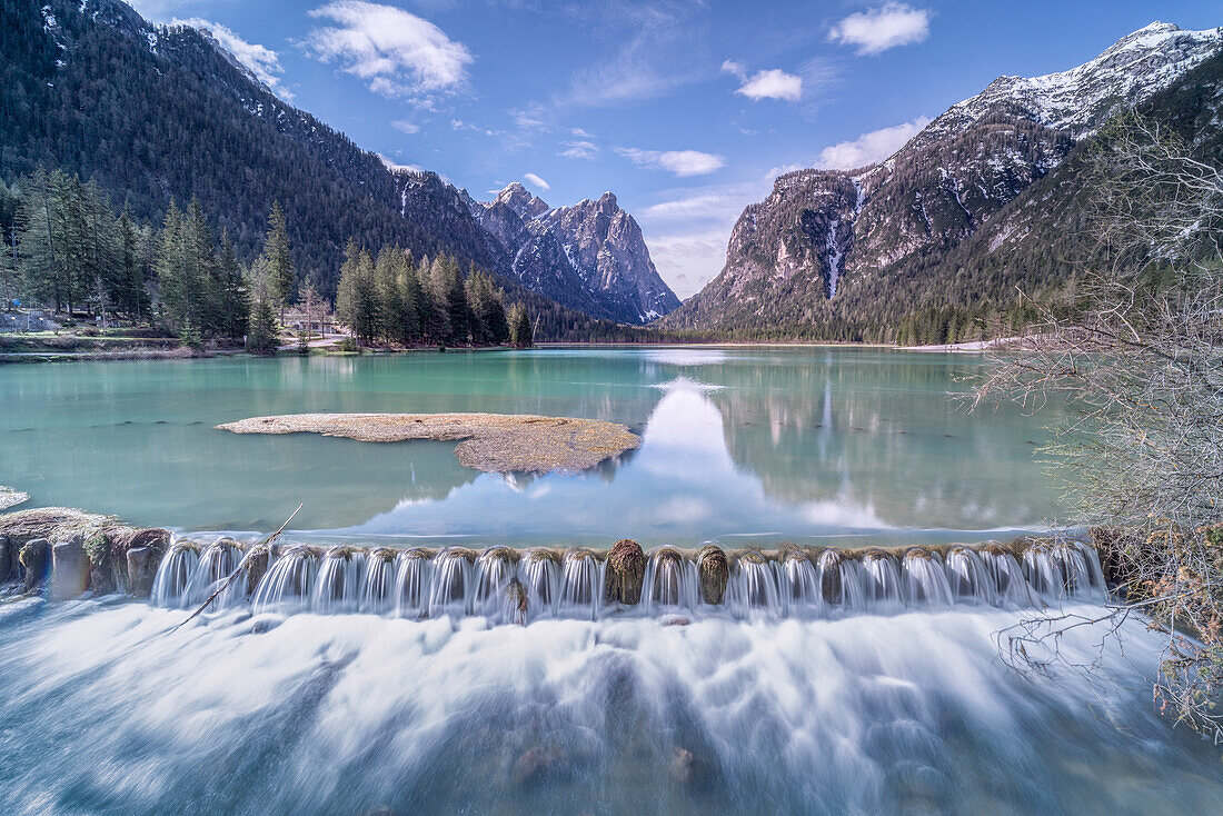 Europe, Italy, Trentino, Dolomites: morning reflections on the Dobbiaco Lake