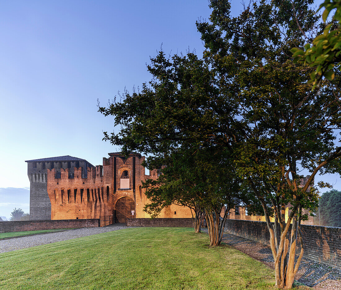 Castle of Soncino, frontal view with light night, Soncino, province of Cremona, Lombardy, Italy, Europe
