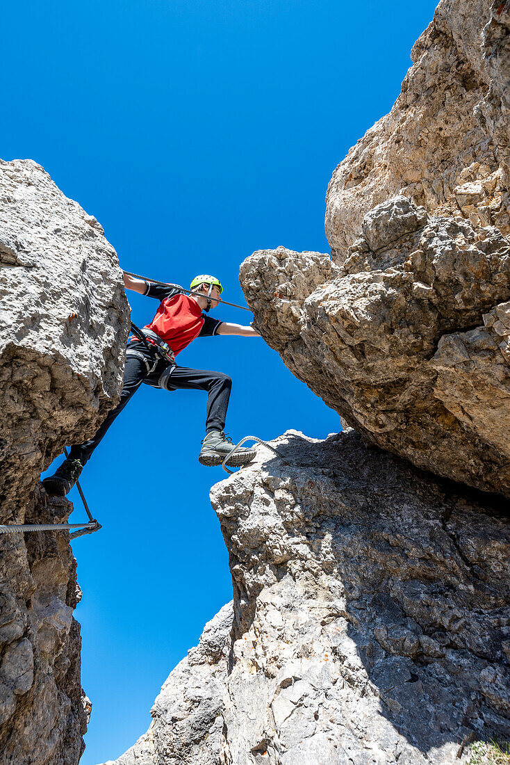 Cir, Dolomites, South Tyrol, Italy. Climber on the via ferrata of Cir V
