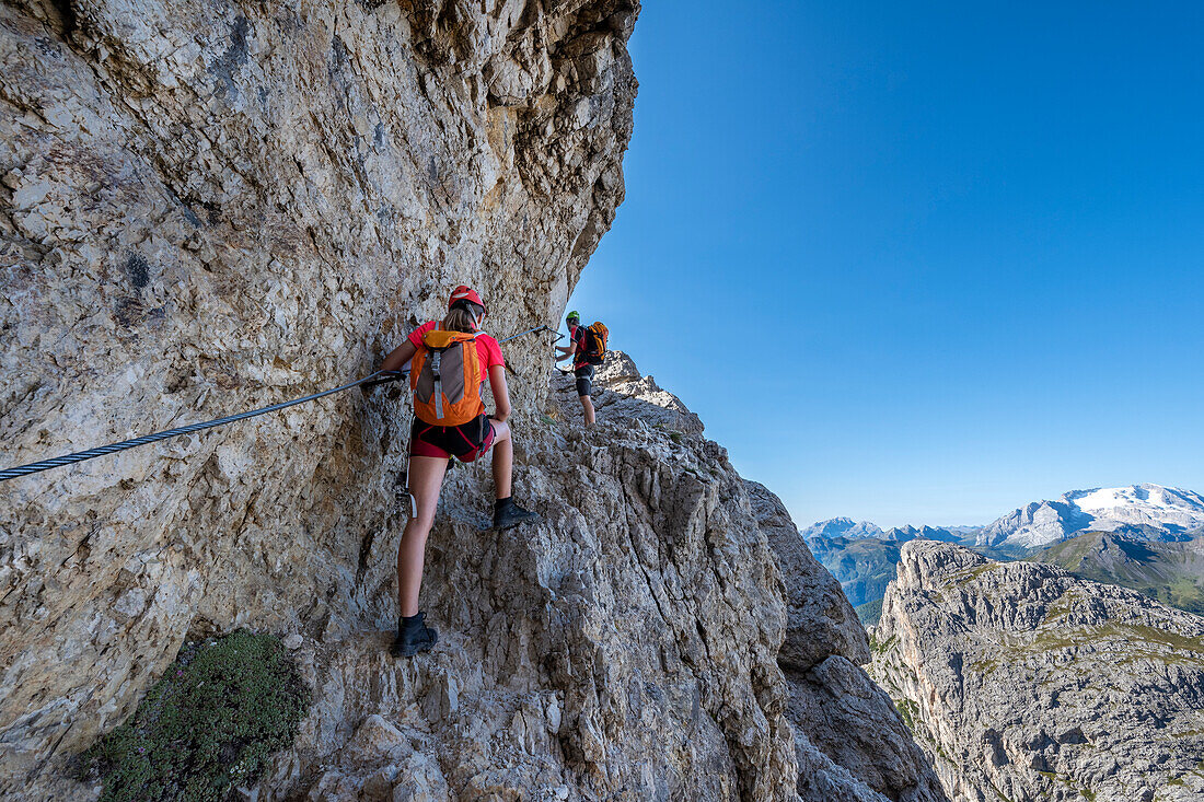 Falzarego Pass, Dolomites, province of Belluno, Veneto, Italy. Mountaineers on the via ferrata "Kaiserjaeger" to the Mount Lagazuoi