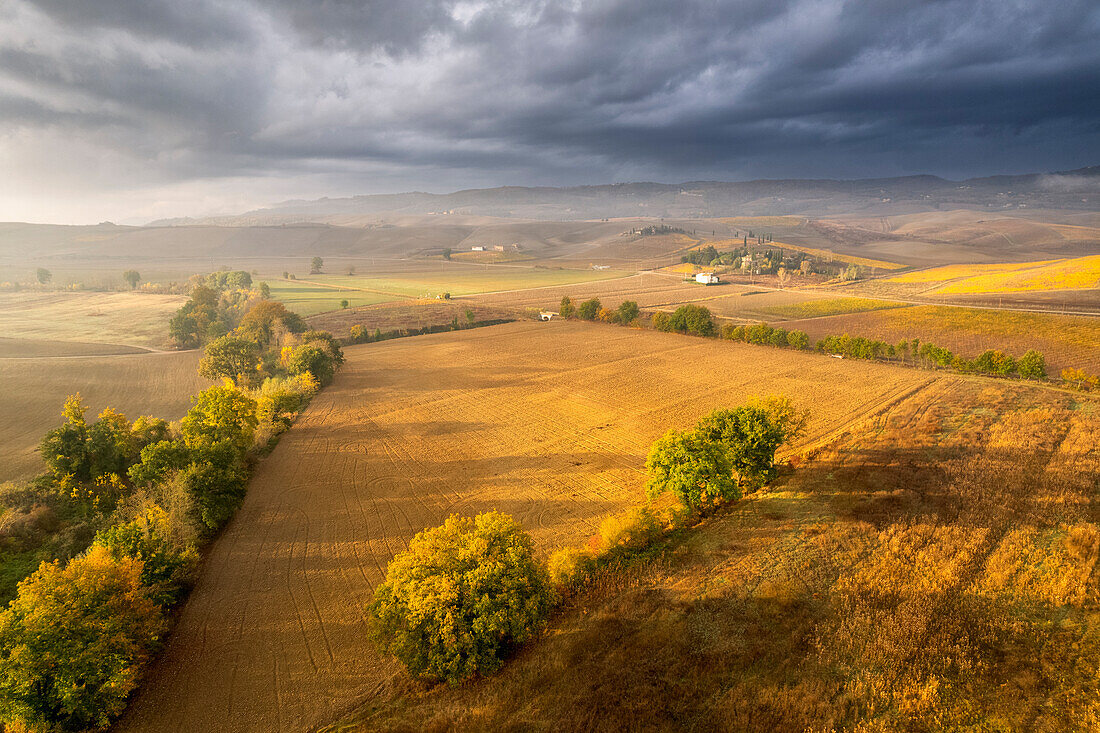 Storm at sunset in Orcia valley, Siena province in Tuscany region, Italy,